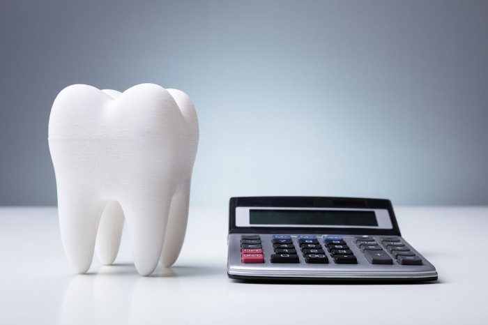 How Much Does Tooth Extraction and Implant Cost?