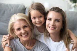 smiling family members smiling family members